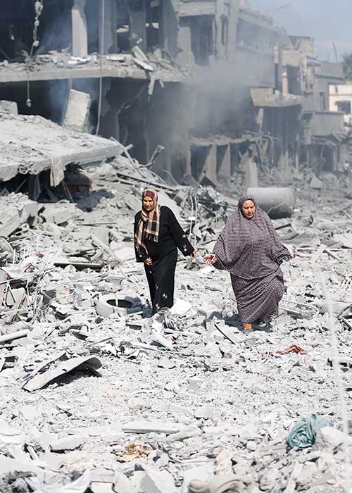 Civilians evacuating destroyed area