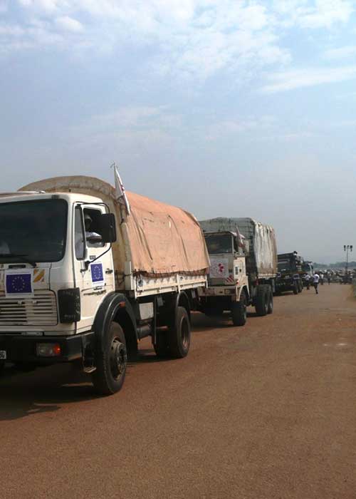 Line of trucks carrying humanitarian supplies
